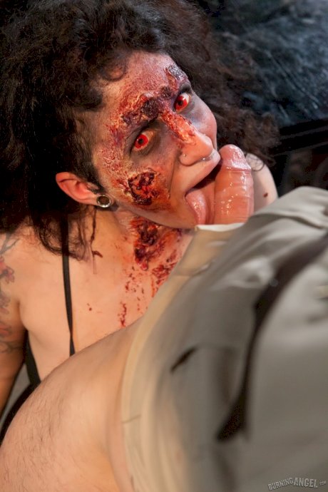 Tattooed pornstars create a Walking Dead scene done as an XXX parody