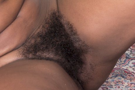 Big nippled hot ebony Bobbie Rains spreads naked to show her hairy pussy