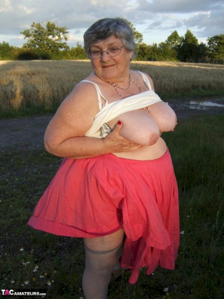 Obese oma Grandma Libby exposes her huge ass while in a field by a rural road