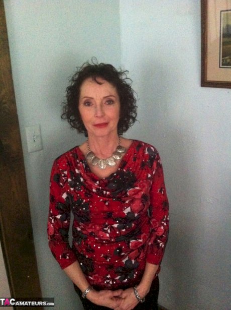 Curly haired mature woman likes sending her younger partner provocative photos