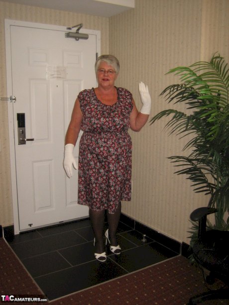 Silver haired nan Girdle Goddess bares her big tits and twat in white gloves