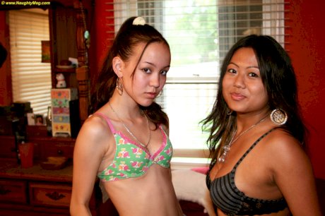Asian amateurs Linda Lee and Amai Liu suck face and tiny titties