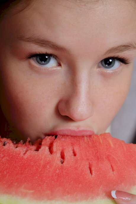 Sweet young Emily Bloom gets watermelon juice on her cute face & shaved pussy