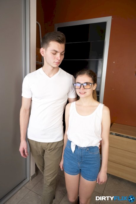 Skinny teen in glasses Bella Gray rides a big cock & takes a facial cumshot