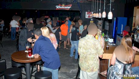 Amateur swinger Tracy Lick and her girls play with horny guys in a night club