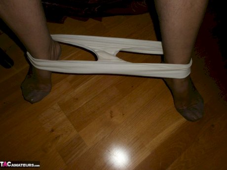 Kinky amateur mature woman Caro reveals and pleases her wolf hairy twat