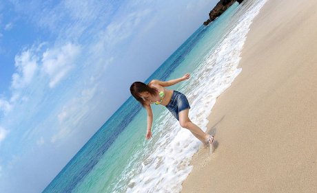 Japanese teen Chikaho Ito models non nude at the beach in a bikini