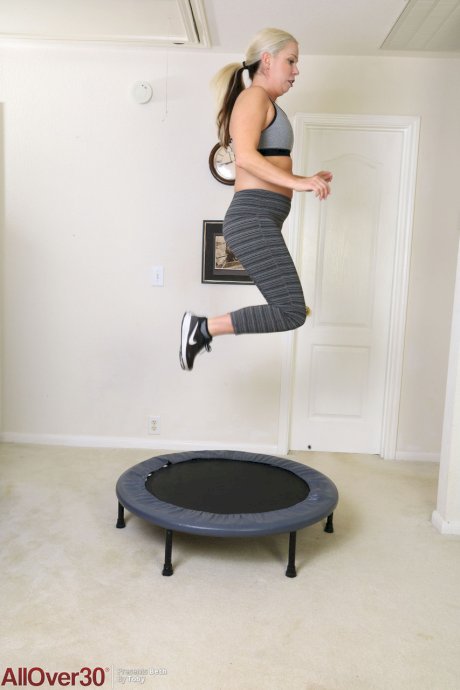 Over 30 blonde Beth gets totally naked on an indoor trampoline