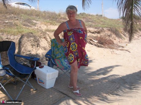 Fat granny Girdle Goddess takes off swimwear to pose nude at the ebach