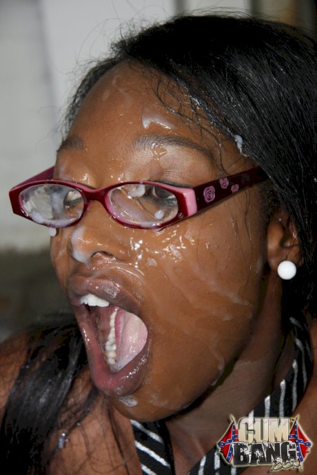 Nerdy ebony Taylor Starr gets her face and glasses covered in cum