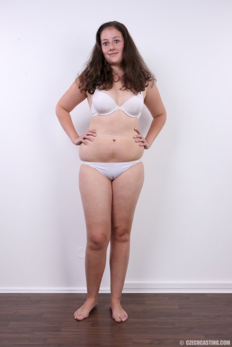Plump girl Klara stands fully clothed before making her totally nude debut