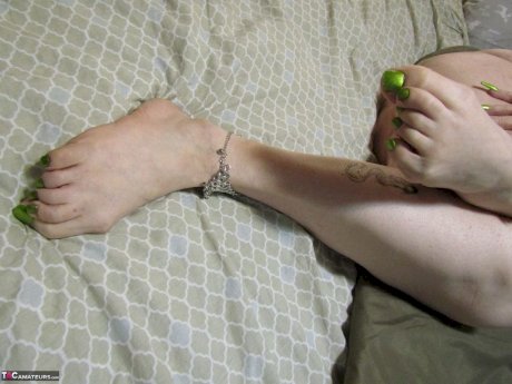 Overweight nan Bunny Gram sports dyed hair while masturbating on a bed