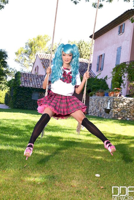 Cosplaying hottie Lucie Wilde shows off her massive hooters outside