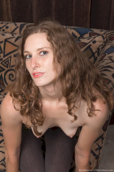 Adorable skinny girl Kiss Montress teases her hairy twat in sexy stockings