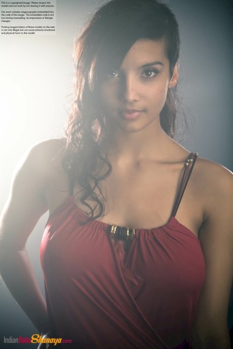 Beautiful Desi female removes her dress to expose her big natural boobs