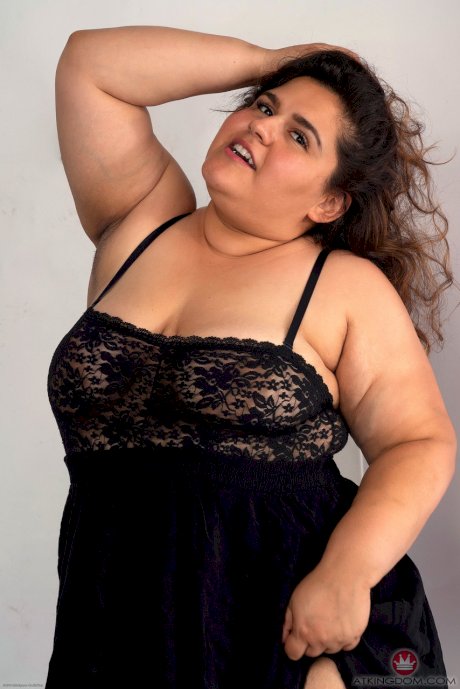 Chubby brunette Karla Lane displays her fat tight pussy up close