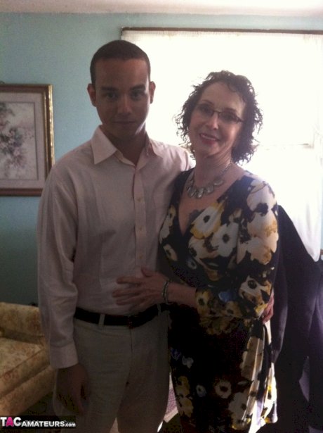 Curly haired mature woman likes sending her younger partner provocative photos