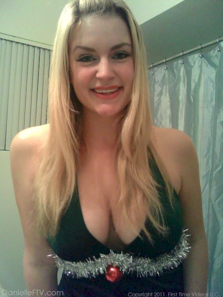 Big titted blonde amateur Danielle takes naughty selfies around the house