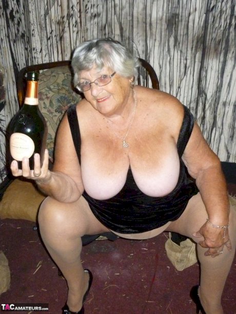 Old woman Grandma Libby sticks an empty bottle of booze in her vagina