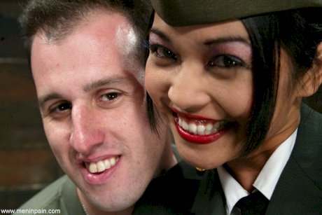 Asian general Mika Tan disciplines a soldier and grabs his dick