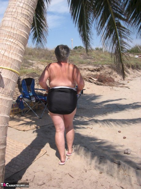 Fat granny Girdle Goddess takes off swimwear to pose nude at the ebach