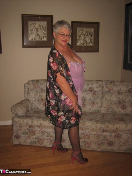 Fat granny Girdle Goddess lets her large boobs loose from lingerie