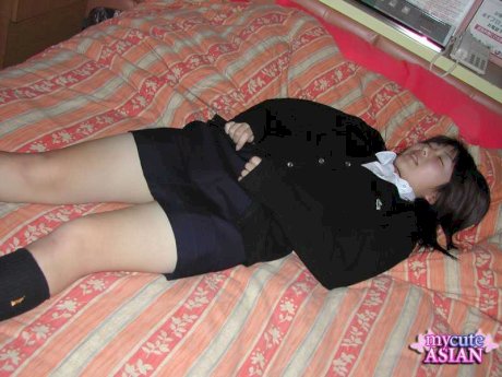 Asian amateur gets totally naked before being masturbated on a bed