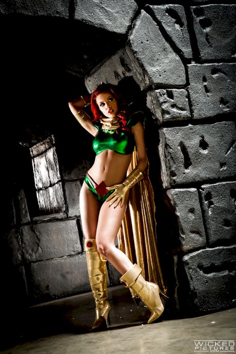 Busty redhead Britney Amber modeling topless in cosplay outfit