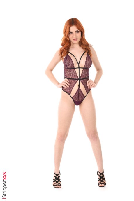 Beautiful redhead Mina Von D removes sensual lingerie before toying her pussy