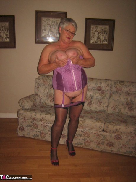 Fat granny Girdle Goddess lets her large boobs loose from lingerie