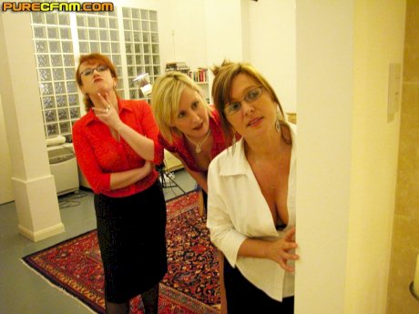 Mature ladies in skirts play with a naked guy's tasty dong in the toilet