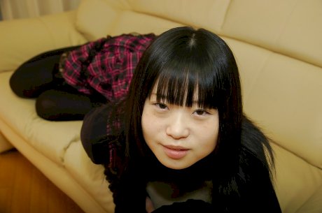 Playful asian schoolgirl Rio Takei getting rid of her clothes