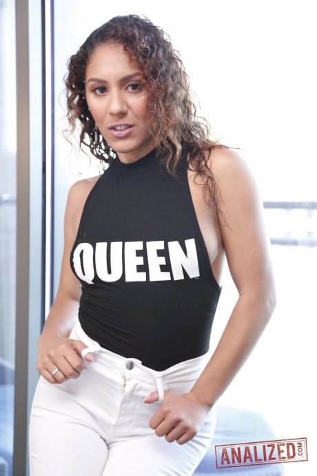 Curly haired beauty Liv Revamped strips, bends over & flaunts her sexy ass