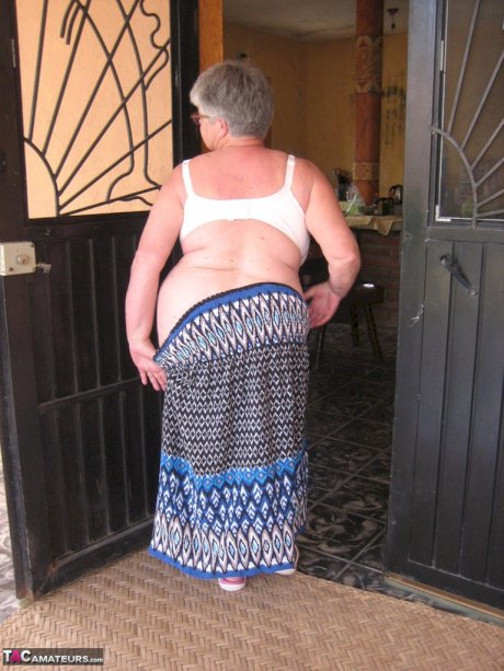 Old amateur Girdle Goddess exposes her obese body outside her front door