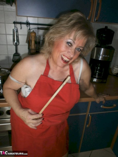 Slutty amateur housewife Caro could not resist masturbating in the kitchen