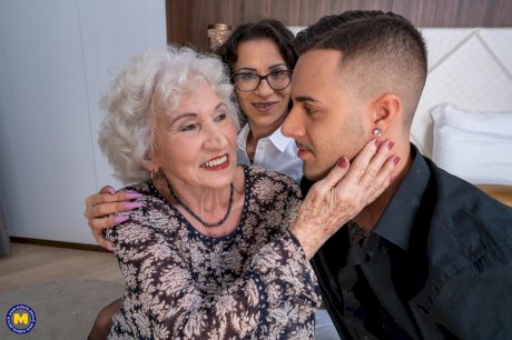 Kinky granny takes part in a threesome with a younger couple