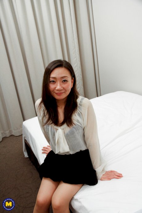 Gorgeous Japanese MILF Sara Yumeka strips and poses in her lingerie
