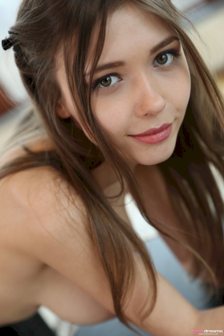 Ukrainian teen with big tits Mila Azul strips & poses naked by the window