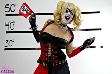Busty cosplay cutie strips her costume to show her cartoonish proportions