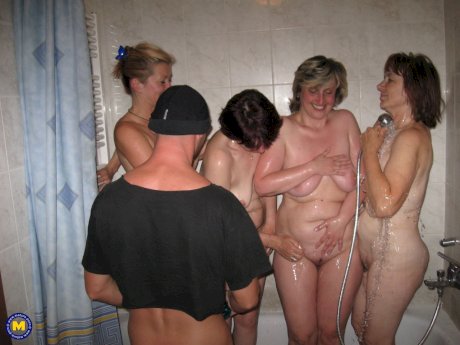 Four insatiable amateur MILFs having group sex with a lucky dude