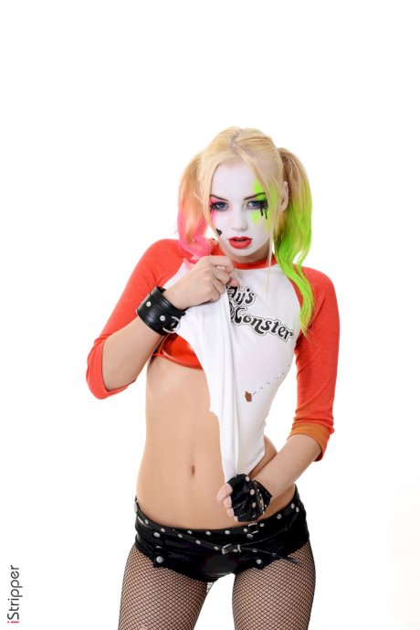 Solo girl with a painted face strips naked after putting down her baseball bat
