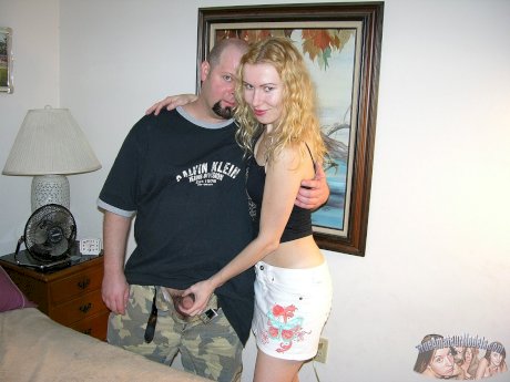 Young Russian girl with blonde hair has cum from a condom dumped on her belly