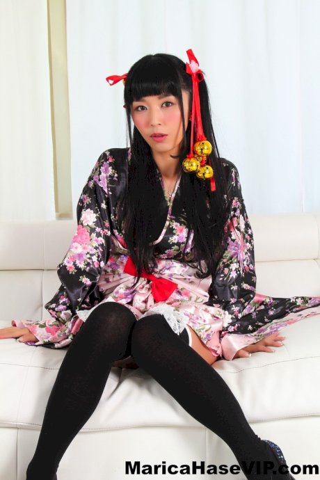 Japanese model Marica Hase exposes her bare ass in over the knee socks