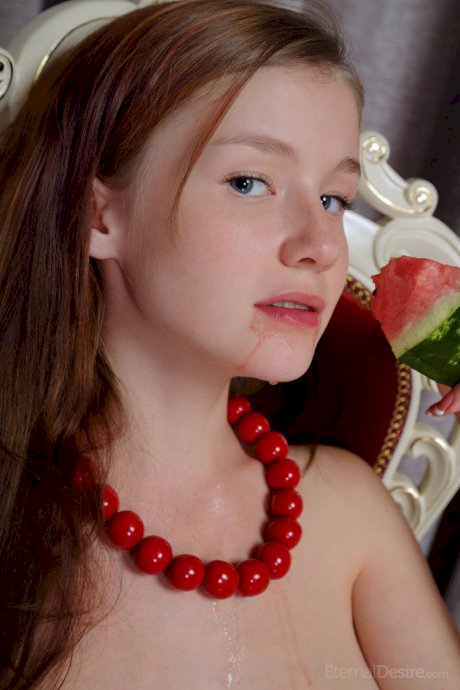 Sweet young Emily Bloom gets watermelon juice on her cute face & shaved pussy
