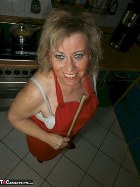 Slutty amateur housewife Caro could not resist masturbating in the kitchen