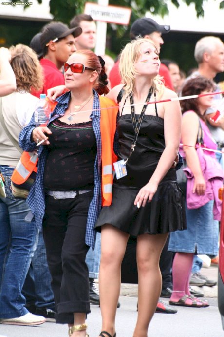 Teen girls at a street party are secretly recorded by a public voyeur