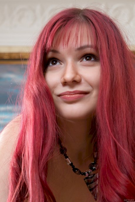 Beautiful redhead Kirstie A shows off her hairy pussy and her puffy nipples