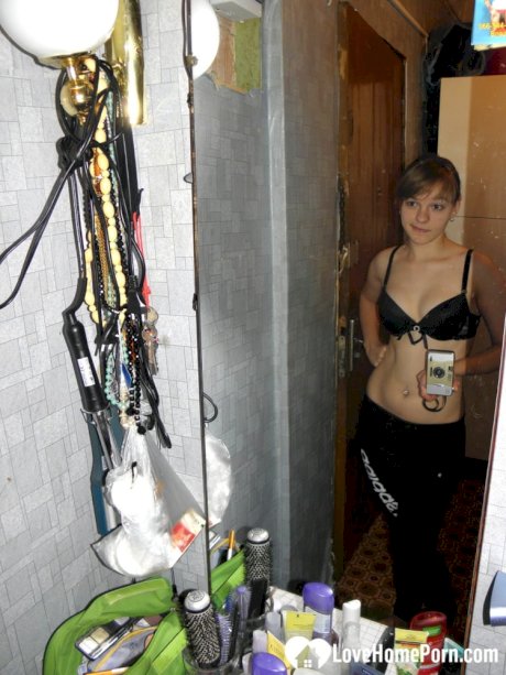 Hot teen with natural tits undresses and takes sexy homemade selfies
