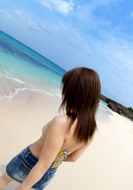 Japanese teen Chikaho Ito models non nude at the beach in a bikini