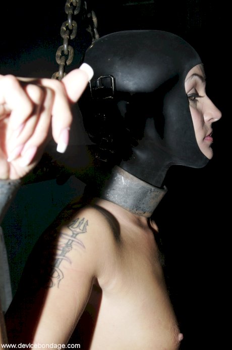 Naughty MILF Sara Faye gets restrained in metal bondage has her pussy abused